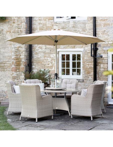 Bramblecrest Chedworth Sandstone 6 Seater Dining Set with Lazy Susan & Parasol